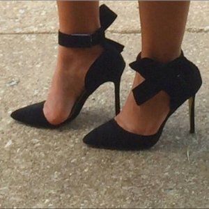 Black suede heels with detachable bows